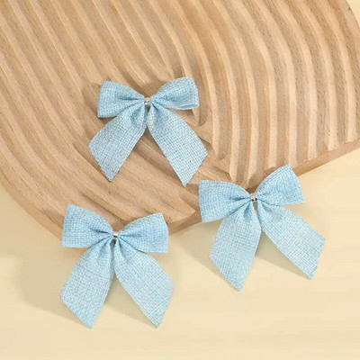 Trakasta mašna Ukrasi za božićno drvce Božićno svjetlucavo božićno drvce Otisnute mašne Ukrasi Božićne zlatne mašne od prašine