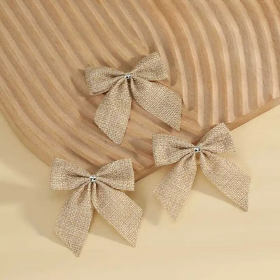 Trakasta mašna Ukrasi za božićno drvce Božićno svjetlucavo božićno drvce Otisnute mašne Ukrasi Božićne zlatne mašne od prašine