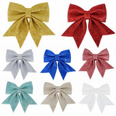 Lieli loki, sarkani zelti, mirdzoši mirdzoši Ziemassvētku tauriņi, Ziemassvētku eglītes piekārtie rotājumi Kāzu svētku ballīte Ziemassvētku rotājumi