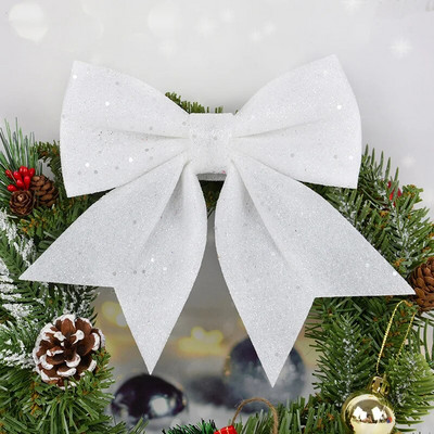 Lieli loki, sarkani zelti, mirdzoši mirdzoši Ziemassvētku tauriņi, Ziemassvētku eglītes piekārtie rotājumi Kāzu svētku ballīte Ziemassvētku rotājumi