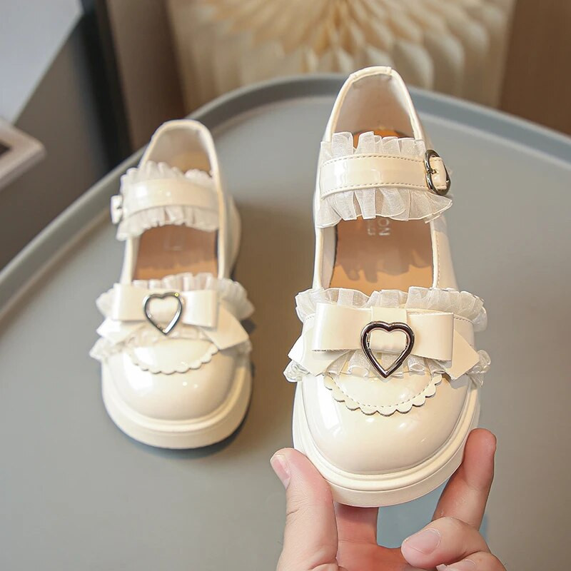 Bērnu modes 2023. gada meiteņu ādas apavi Lolitas stila mežģīnes vienkrāsainas, elegantas pavasara seklas ķepas Jauki princešu apavi bērniem