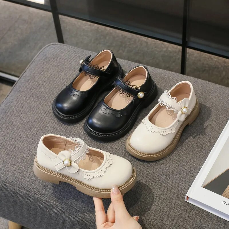 Nove kožne cipele za djevojčice Jednostavna čipkasta mašna Dječja modna ležerna obuća s okruglim prstima Dječje natikače princeze Lolita stil Proljeće 2023.