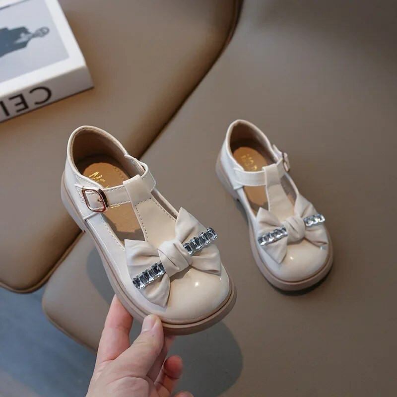Jesen 2023. Nove ležerne kožne cipele za djevojčice u korejskom stilu s mašnom slatke princeze s mekanim potplatom s T-remenom Moda za djecu ležerne Mary Janes PU