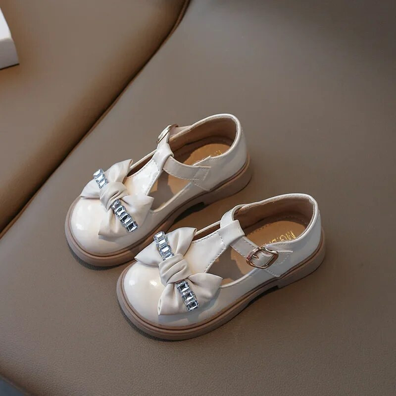 Jesen 2023. Nove ležerne kožne cipele za djevojčice u korejskom stilu s mašnom slatke princeze s mekanim potplatom s T-remenom Moda za djecu ležerne Mary Janes PU