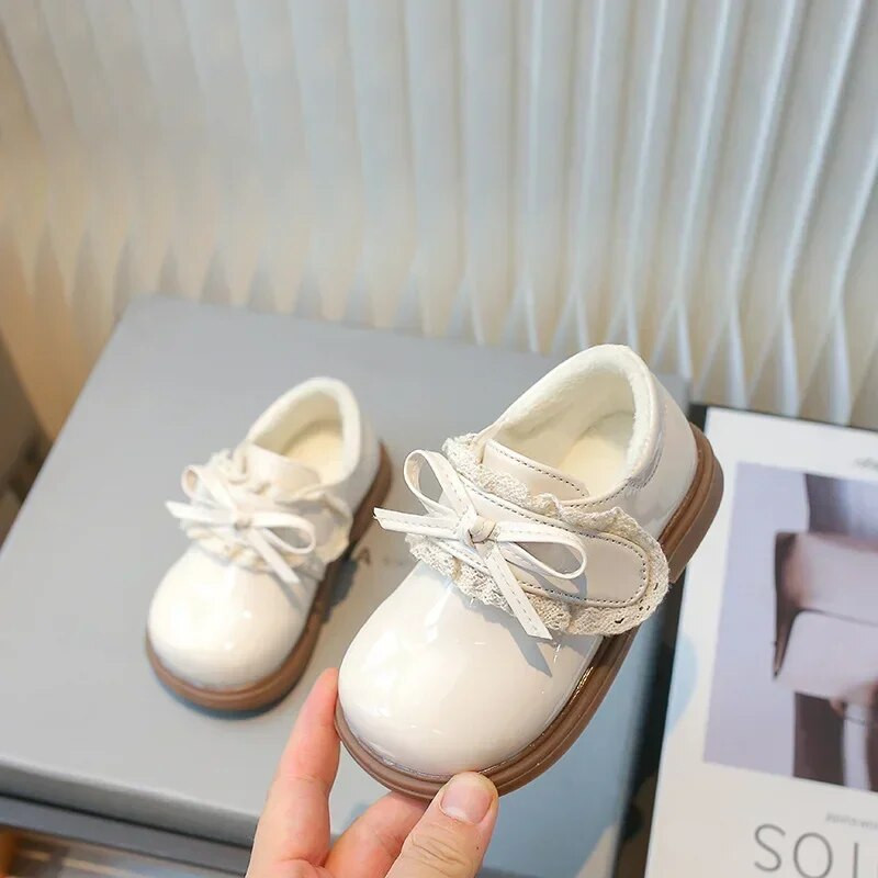 Nove zimske kožne cipele za djevojčice Mary Jane Modne sjajne krznene tople plišane dječje ravne cipele Elegantne dječje cipele za princezu s mašnama