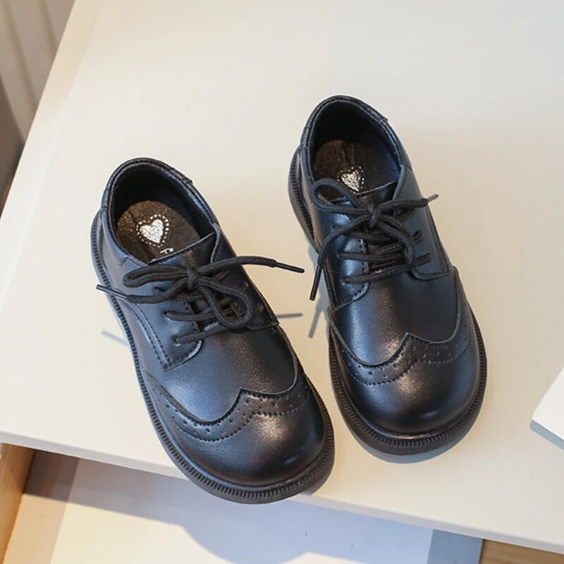 Jaunas pavasara rudens bērnu ādas apavu modes elpojošas bērnu deju kleitas kurpes Skolas daudzpusīgi melni plakani apavi zēniem