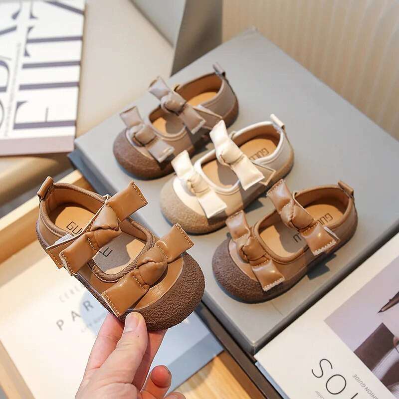 Elegáns babacipők őszi új hercegnős cipők lányoknak puha, aranyos dupla masnis gyereklapok divatos, lélegző gyerek bőrcipők