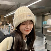 Jednobojne vunene pletene kape za žene Zimska spuštena kapa Jednobojne tople kape sa štitnicima za uši