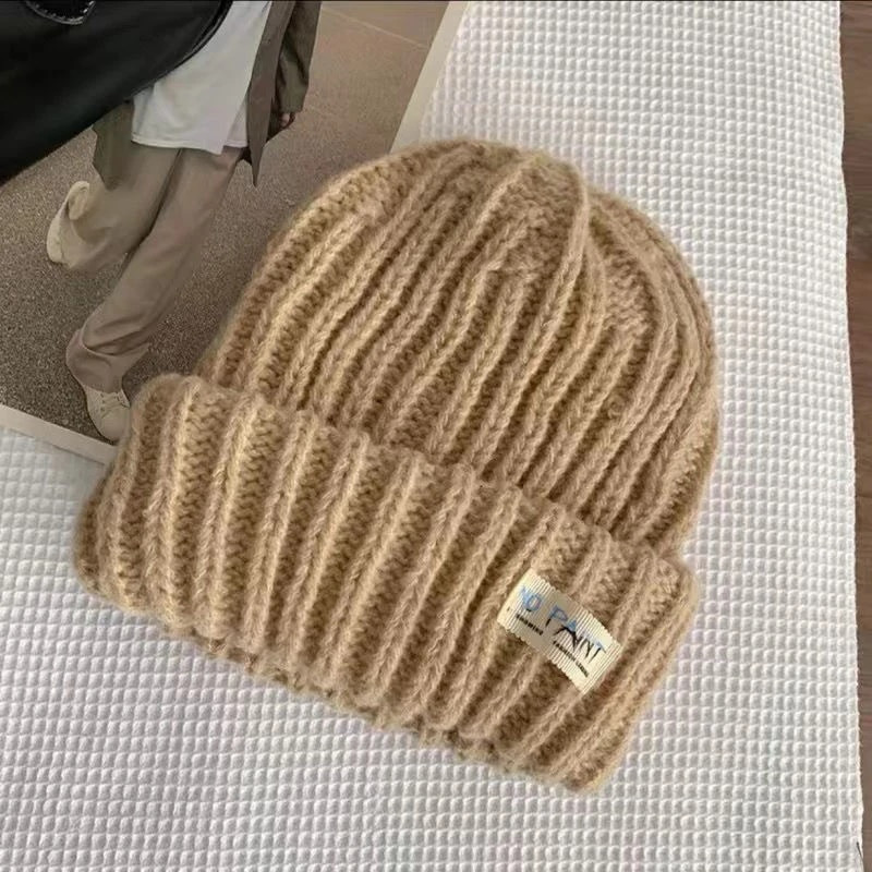 Jednobojne vunene pletene kape za žene Zimska spuštena kapa Jednobojne tople kape sa štitnicima za uši