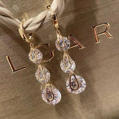 Izsmalcināti trendi kristāla apaļi kulonu auskari sievietēm Modes cirkonija auskari izcili līgavu kāzu rotaslietas jauka dāvana