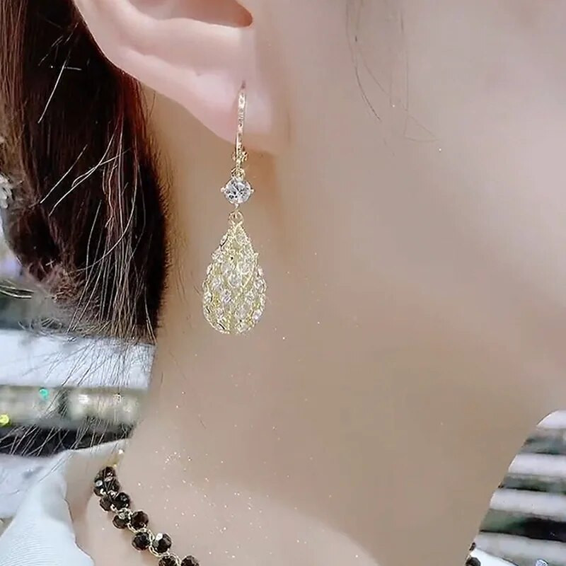 Luksusa rotaslietas sievietēm Cirkona caurdurti ūdens pilienu auskari sievietēm Bohēmijas temperamenta Eleganti Rhinestone Auskari pendientes