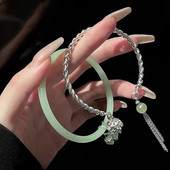 Vintage karkötő szél tiszta víz zöld utánzat jáde kalcedon nyitó Dingdang karkötő női csengő édes ékszer ajándék