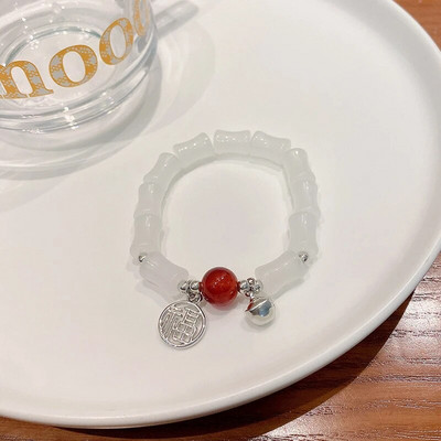 Vintage karkötő szél tiszta víz zöld utánzat jáde kalcedon nyitó Dingdang karkötő női csengő édes ékszer ajándék