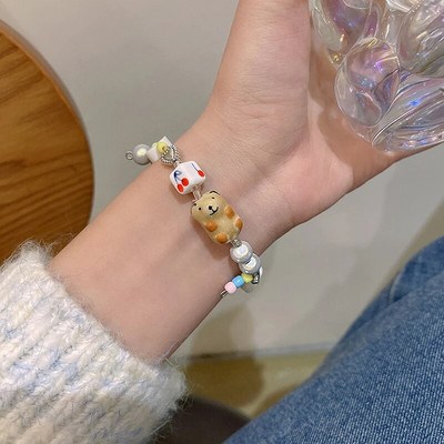 Vintage karkötő szél tiszta víz zöld utánzat jáde kalcedon nyitó Dingdang karkötő női csengő édes ékszer ajándék