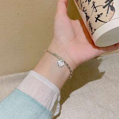 Vintage karkötő szél tiszta víz zöld utánzat jáde kalcedon nyitó Dingdang karkötő női csengő édes ékszer ajándék