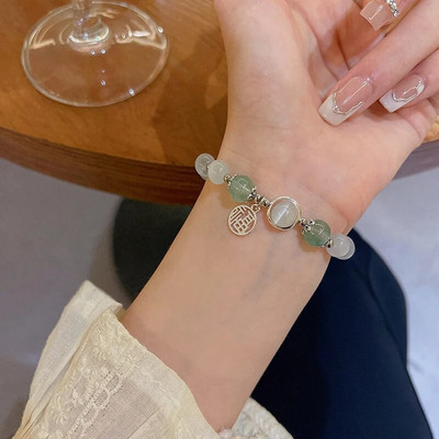 Vintage karkötő szél tiszta víz zöld utánzat jáde kalcedon nyitó Dingdang karkötő női csengő édes ékszer ajándék