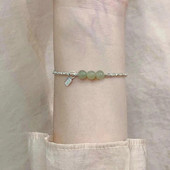 2023. gada Dienvidkorejas jaunā Hetiānas nefrīta sudraba rokassprādzes imitācija sievietēm ar daudzpusīgu kaķa acu rotaslietas dāvanu