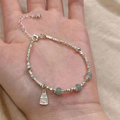 2023. gada Dienvidkorejas jaunā Hetiānas nefrīta sudraba rokassprādzes imitācija sievietēm ar daudzpusīgu kaķa acu rotaslietas dāvanu