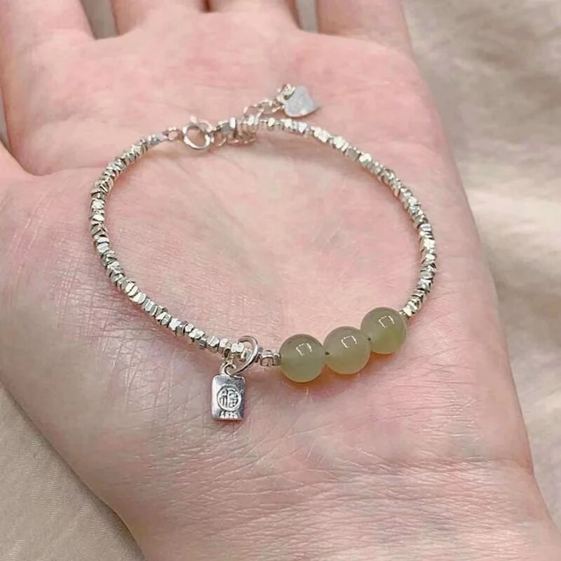 2023. gada Dienvidkorejas jaunā Hetiānas nefrīta sudraba rokassprādzes imitācija sievietēm ar daudzpusīgu kaķa acu rotaslietas dāvanu