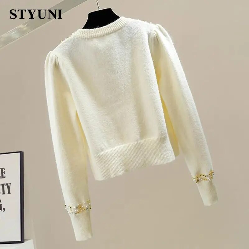 Geltonos spalvos siuvinėtos blykstės O formos kaklo prašmatnios ilgomis rankovėmis akrilo megztas moteriškas megztinis korėjietiškas mados storas kardiganas rudens žiema