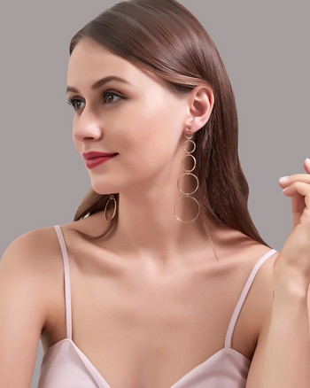 Γυναικεία κρεμαστά σκουλαρίκια και σκουλαρίκια σταγόνας με χρυσό ασήμι σε κούφιο κράμα με απλή φούντα
