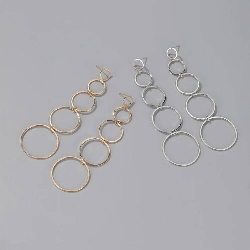 Paprasti kutai, penkių apskritimų tuščiaviduriai lydiniai, padengti auksu sidabru, moteriški kabantys auskarai ir nuleidžiami auskarai