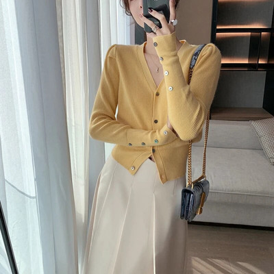 2023. gada rudens/ziemas V veida kakla izgriezuma trikotāžas sieviešu īss džemperis Modes daudzpusīgs SLIM korejiešu stila jaciņš sievietēm ar garām piedurknēm