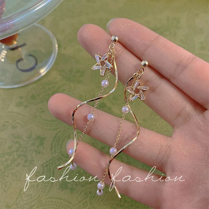 Modes paziņojums Jauni gari kristāla zvaigznes pušķis pērļu zelta auskari sievietēm personības auskari kāzu grezni rotaslietas dāvanas