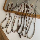 Σχεδιασμός στυλ καφέ χρώμα ρετρό Νέο κινέζικο στυλ Χειροποίητο πέτρινο ξύλινο κολιέ με χάντρες ιδιοσυγκρασία κολιέ γυναίκα