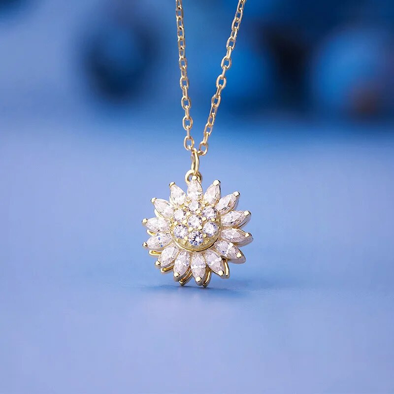 Luksusa modes cirkona rotācijas margrietiņa saulespuķu kulons kaklarota, rotējoša kristāla ziedu nerūsējošā tērauda dizaineru rotaslietas