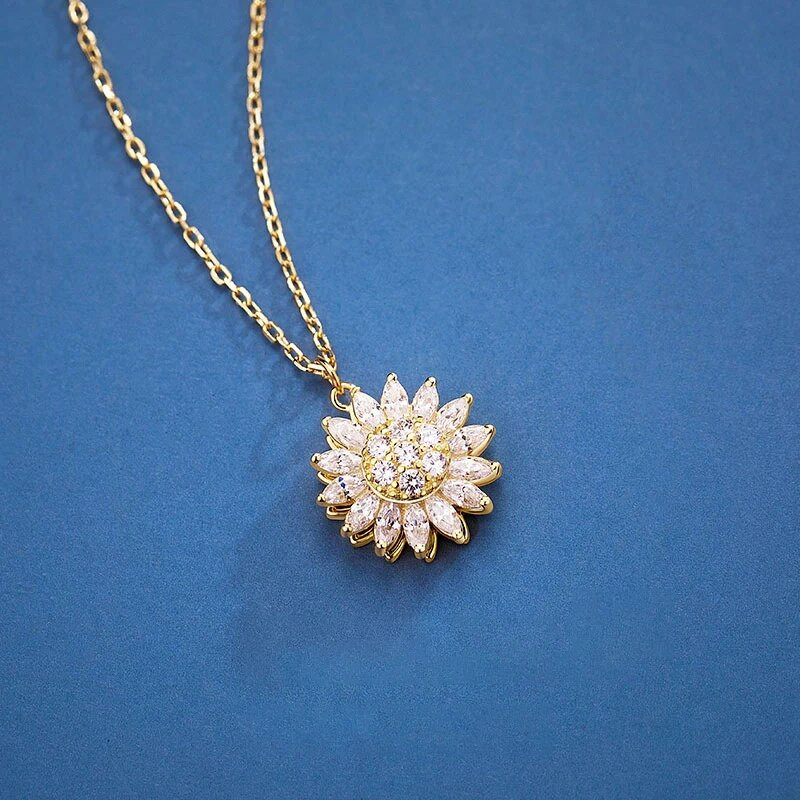 Luksusa modes cirkona rotācijas margrietiņa saulespuķu kulons kaklarota, rotējoša kristāla ziedu nerūsējošā tērauda dizaineru rotaslietas