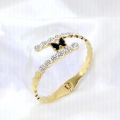 Titāna tērauda jauna modes melna tauriņa rokassprādze ar pavasara atvēršanas dizaina sieviešu nerūsējošā tērauda rokassprādzēm