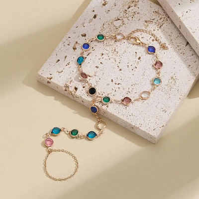 Cxwind modernais un populārais apvienojums ar plaukstu krāsas dārgakmeņu ķēdēm un spilgtām akmens rokassprādzēm kā dzimšanas dienas dāvanas