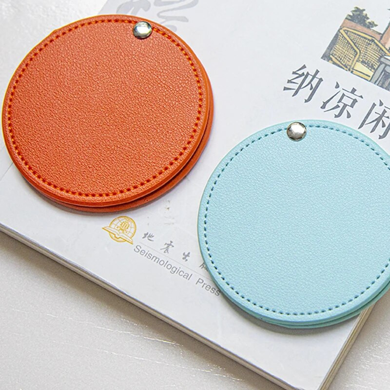 1PC salokāms kabatas spogulis PU kosmētiskais spogulis mini apaļš grima spogulis ceļojumu grima rīks uznirstošais dizains apaļas formas DIY pārnēsājams