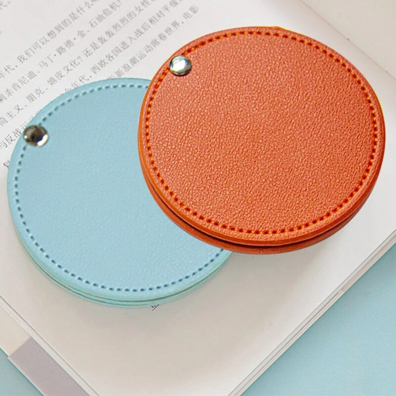 1PC salokāms kabatas spogulis PU kosmētiskais spogulis mini apaļš grima spogulis ceļojumu grima rīks uznirstošais dizains apaļas formas DIY pārnēsājams