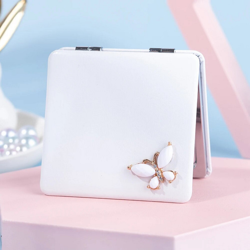 Mini Pocket Cosmetic Beauty sminktükör, 2-arcú PU bőr hordozható nagyító, összecsukható kompakt tükör, pillangós buli