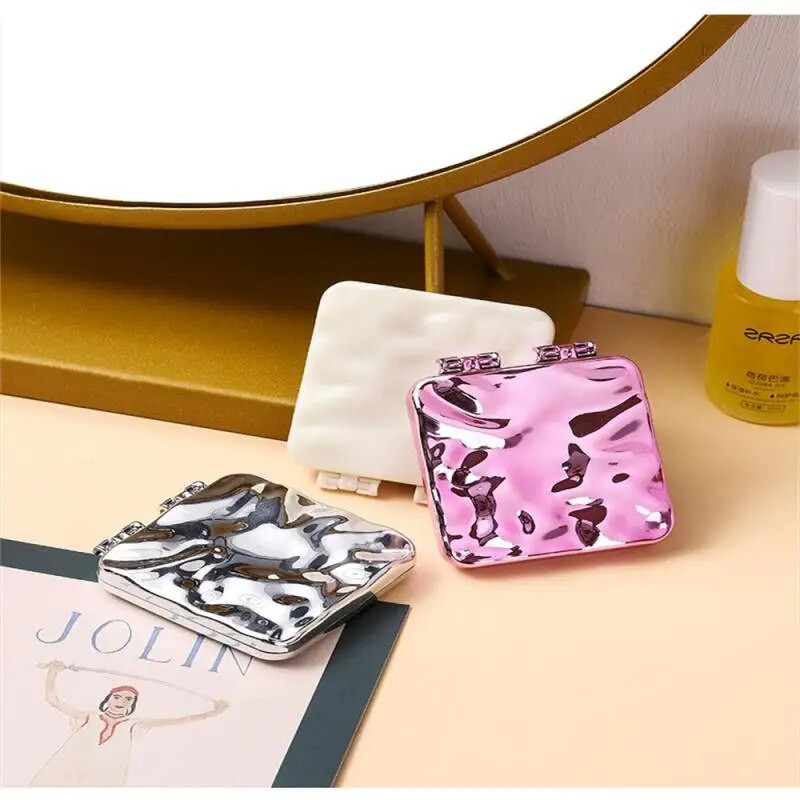 Rokās salokāms pārnēsājams kabatas spogulis var stāvēt Mini krāsains darbvirsmas dekoratīvais spogulis Rokā turami salokāmi kosmētikas spoguļi