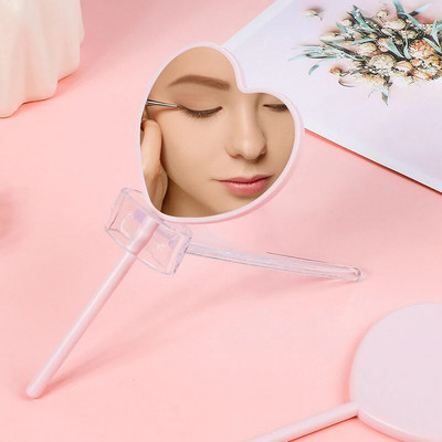 Rokā turams kosmētikas spogulis Mīlestības sirds spogulis Sieviešu roktura grims Kosmētiskie Skaistumkopšanas rīki Rokas kosmētiskais kosmētikas spogulis