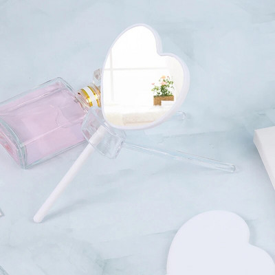 Rokā turams kosmētikas spogulis Mīlestības sirds spogulis Sieviešu roktura grims Kosmētiskie Skaistumkopšanas rīki Rokas kosmētiskais kosmētikas spogulis