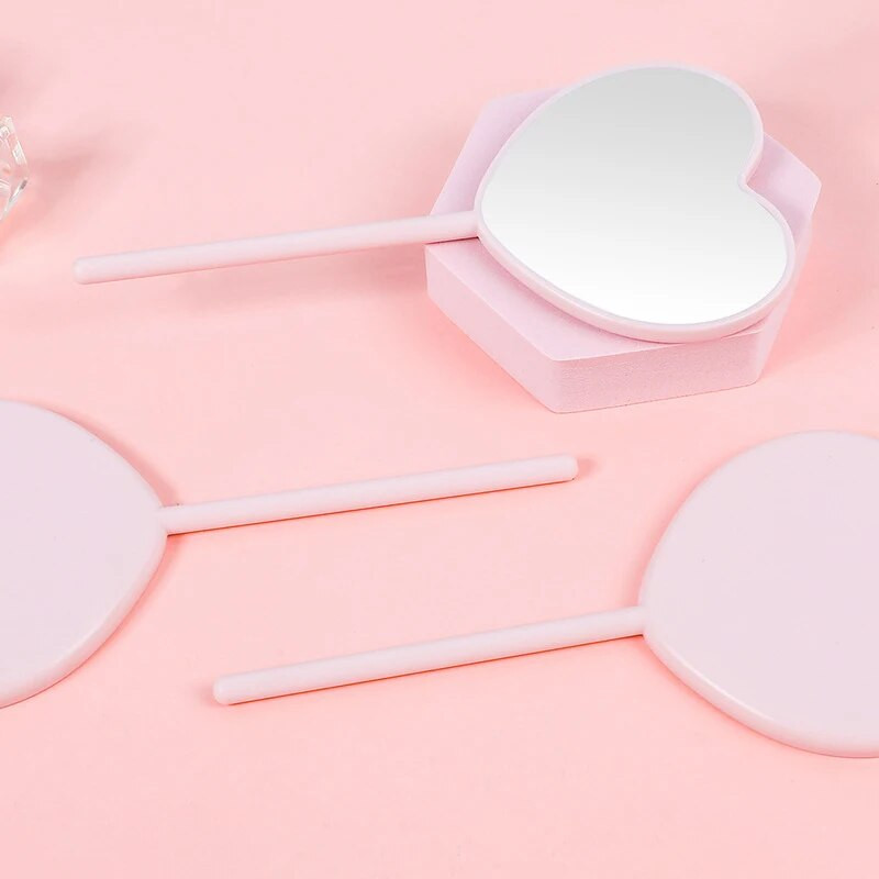 Rokā turams kosmētikas spogulis Mīlestības sirds spogulis Sieviešu roktura grims Kosmētiskie Skaistumkopšanas rīki Rokas kosmētiskais kosmētikas spogulis