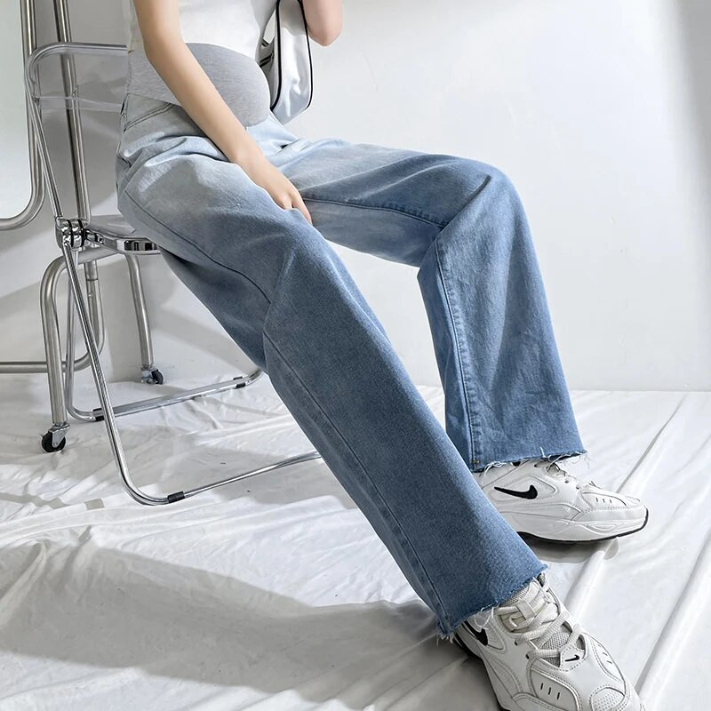 Pavasara platas, vaļīgas džinsa auduma pilni garie džinsi grūtniecēm ar caurumu elastīgu vidukli vēdera taisnās bikses grūtniecēm