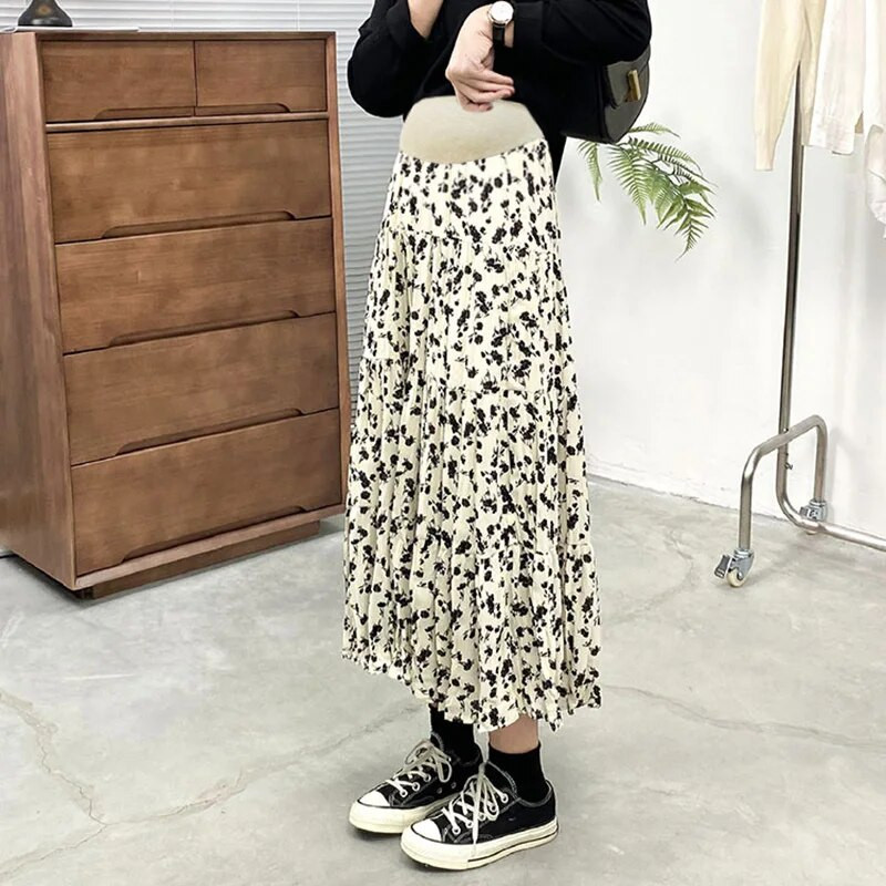 Bēšs, melns, grūtniece