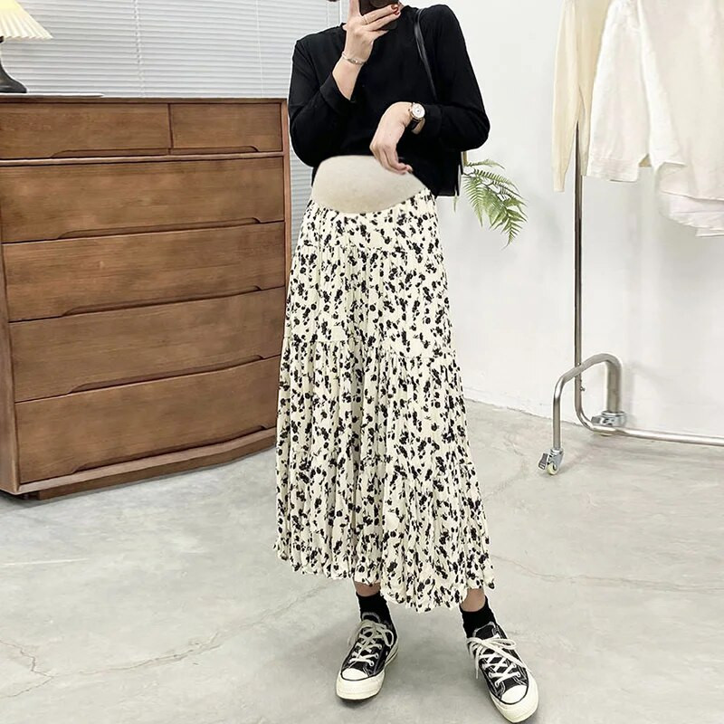 Bēšs, melns, grūtniece