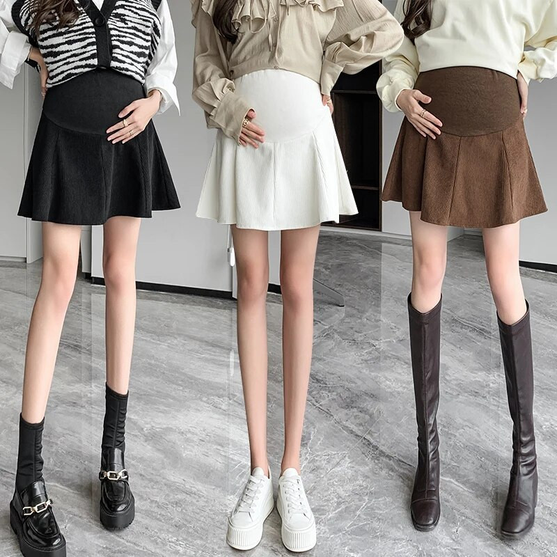 2023. gada Preppy Style grūtnieču vēdera svārki Modes ar augstu vidukļa svārki grūtniecēm lietussargsvārki Biroja dāmu eleganti mini A līnijas svārki