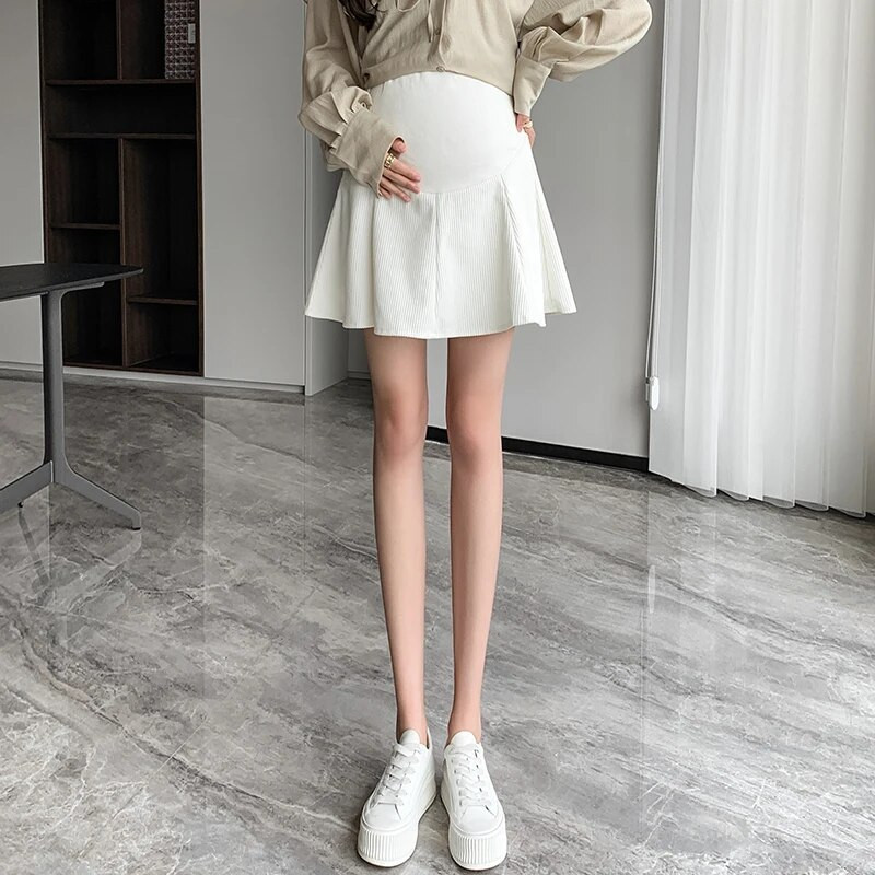 2023. gada Preppy Style grūtnieču vēdera svārki Modes ar augstu vidukļa svārki grūtniecēm lietussargsvārki Biroja dāmu eleganti mini A līnijas svārki