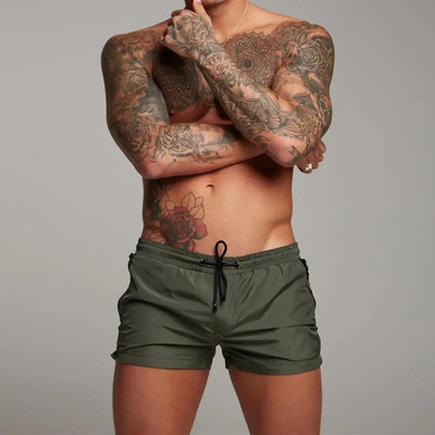 2021-es új férfi fürdőruha Szexi fürdőruha Férfi úszónadrágok Férfi rövidnadrágok Strandnadrágok Sportruhák Szörfdeszkás rövidnadrágok Férfi fürdőnadrágok