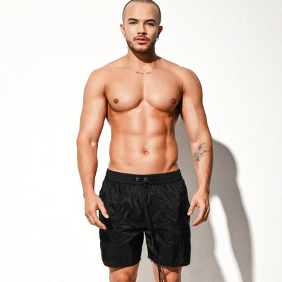 Nove muške prozračne kratke hlače za plažu Kupaći kostim Trup Muške prozirne kupaće gaće Kupaći kostim Udobni kupaći kostimi Muški kupaći kostim