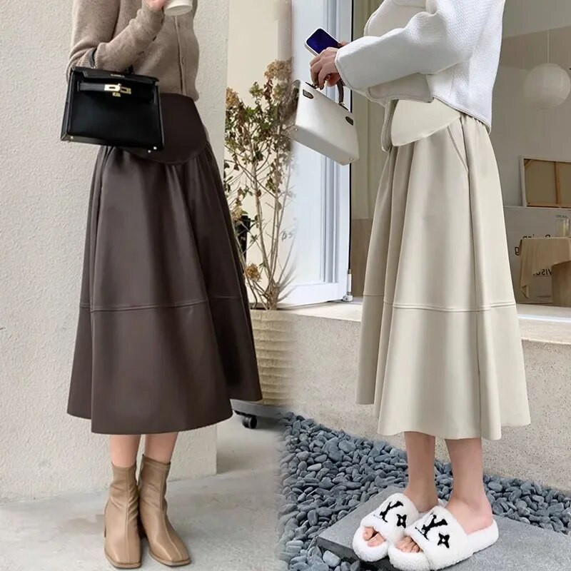 1171# Rudens ziemas mode PU grūtnieču svārki elastīgi viduklis vēders, brīvas līnijas apģērbs grūtniecēm, grūtniecība