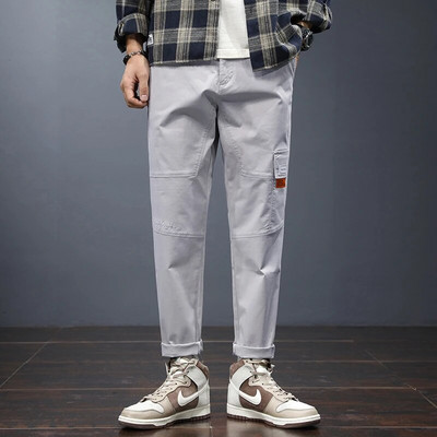 2023. gada rudenī populāras vīriešu ikdienas bikses, mīkstas, ērtas, brīvas, pieguļošas, daļēji elastīgas, plānas vīriešu bikses