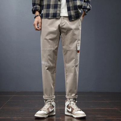2023. gada rudenī populāras vīriešu ikdienas bikses, mīkstas, ērtas, brīvas, pieguļošas, daļēji elastīgas, plānas vīriešu bikses